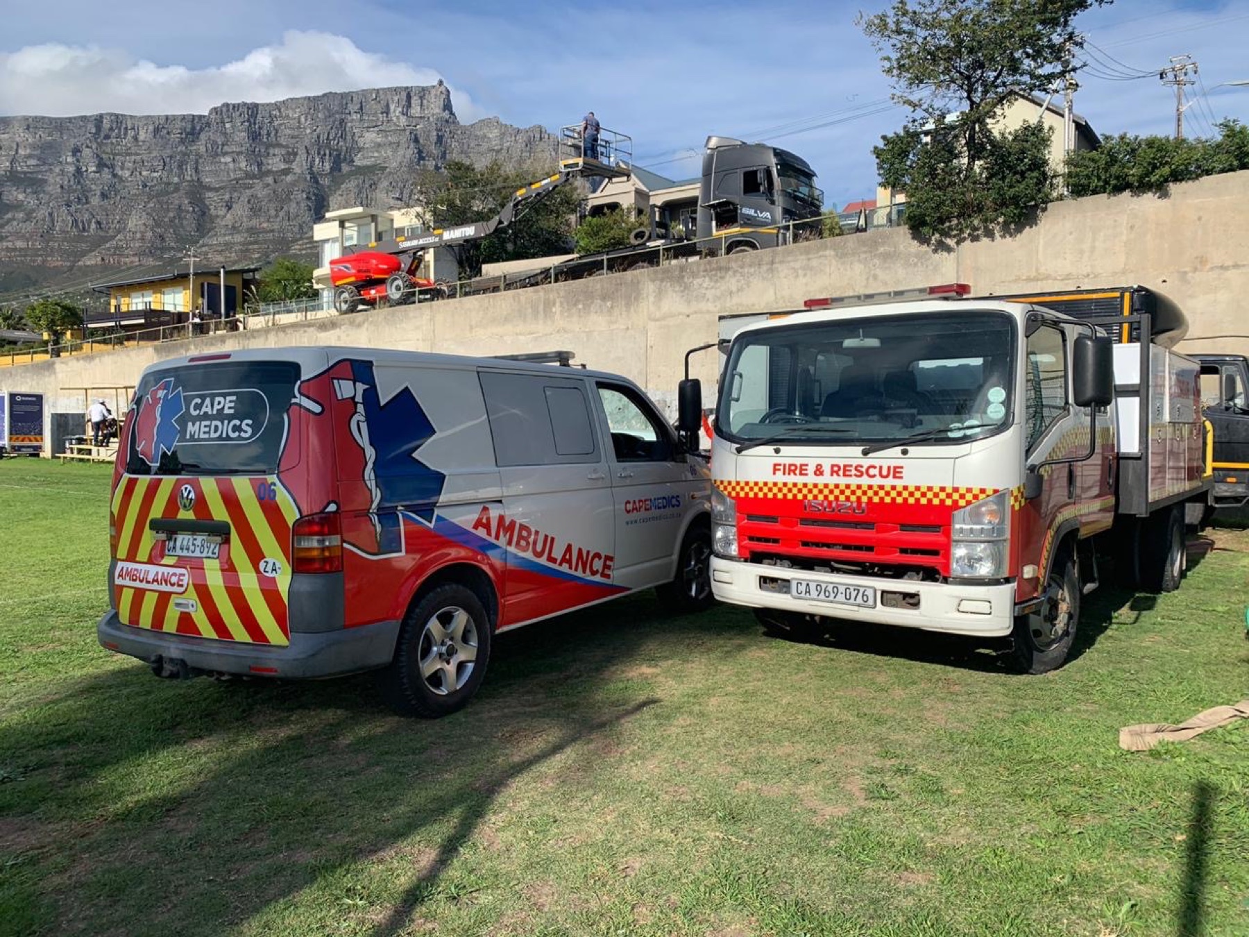 Cape Medics ambulance and fire rescue vehicle on location below Table Mountain